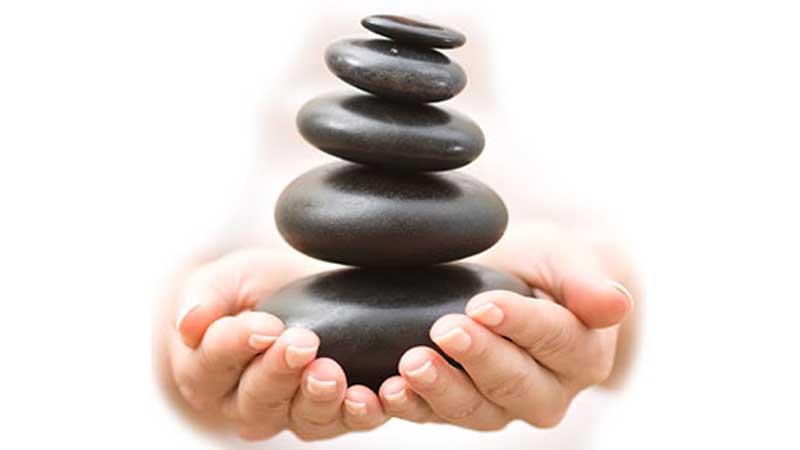 Visit Divine Day Spa for a heavenly hot stone massage - A top to toe indulgence to relieve aching bodies.